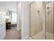 Walk-in shower with glass door in a modern bathroom at 7770 Sandy Ridge Dr # 114, Reunion, FL 34747