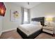 Inviting bedroom with comfortable bed, modern decor, and ample natural light at 7770 Sandy Ridge Dr # 114, Reunion, FL 34747