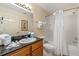 Bathroom with tub, shower, and granite vanity at 8112 Poinciana Blvd # 1709, Orlando, FL 32821