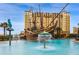 Resort-style pool with a pirate ship water feature, creating a playful and fun atmosphere at 8112 Poinciana Blvd # 1709, Orlando, FL 32821