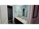 Bathroom with double vanity and granite countertops at 3811 Island Green Way, Orlando, FL 32824