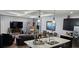 Open concept kitchen and living area with island and seating at 3811 Island Green Way, Orlando, FL 32824