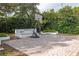Outdoor basketball court with brick pavers and seating at 11410 Rapallo Ln, Windermere, FL 34786