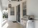 Outdoor grilling station and patio with access to the backyard at 11410 Rapallo Ln, Windermere, FL 34786