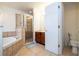 Clean bathroom with shower, tub, and updated vanity at 11410 Rapallo Ln, Windermere, FL 34786