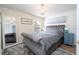 Cozy bedroom with full-size bed and wood flooring at 11410 Rapallo Ln, Windermere, FL 34786