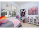 Cozy bedroom with twin bed, closet, and decorative accents at 11410 Rapallo Ln, Windermere, FL 34786