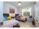 Charming bedroom with twin beds and plenty of natural light at 11410 Rapallo Ln, Windermere, FL 34786