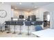 Kitchen with breakfast bar and modern finishes at 11410 Rapallo Ln, Windermere, FL 34786