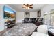 Relaxing living room with sectional sofa, large TV, and ceiling fan at 11410 Rapallo Ln, Windermere, FL 34786