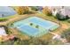 Two well-maintained tennis courts in a residential community at 11410 Rapallo Ln, Windermere, FL 34786