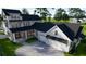 Luxury two-story farmhouse with large backyard and attached garage at 1258 Ridge Lake Way, Oakland, FL 34787