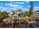 Beautiful backyard featuring a pool, spa, and a dock with boat lift at 25 Cunningham Dr, New Smyrna Beach, FL 32168