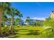 Lush green space surrounds the community of colorful townhomes at 2956 Caribbean Soul Dr, Kissimmee, FL 34747