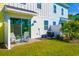 Exterior view of colorful townhomes with private patios at 2956 Caribbean Soul Dr, Kissimmee, FL 34747