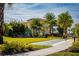 playground and shuffleboard court surrounded by palm trees at 2956 Caribbean Soul Dr, Kissimmee, FL 34747