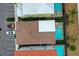 Aerial view of house with private pool and parking at 3056 Parrot Head Pl, Kissimmee, FL 34747
