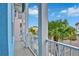 Private balcony overlooking a tropical community with parking at 3056 Parrot Head Pl, Kissimmee, FL 34747