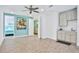 Spacious common area with built-in wet bar and access to bedroom at 3056 Parrot Head Pl, Kissimmee, FL 34747