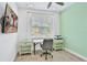 Bright home office featuring a desk, chair, and ample natural light at 3056 Parrot Head Pl, Kissimmee, FL 34747