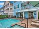 Relaxing pool and spa with patio furniture and grill at 3056 Parrot Head Pl, Kissimmee, FL 34747