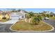 House with a two-car garage and a spacious yard at 3965 Journey Ct, Casselberry, FL 32707