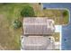 Top-down view of two homes with brown roofs at 3965 Journey Ct, Casselberry, FL 32707