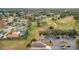 Aerial view of community with golf course nearby at 3965 Journey Ct, Casselberry, FL 32707
