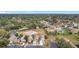 Aerial view of homes, tennis courts, and neighborhood at 3965 Journey Ct, Casselberry, FL 32707