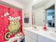 Clean bathroom with shower/tub combo and updated vanity at 3965 Journey Ct, Casselberry, FL 32707
