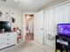 Bright bedroom with large closet and view of hallway at 3965 Journey Ct, Casselberry, FL 32707