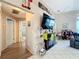 Bright hallway with light wood flooring and access to other rooms at 3965 Journey Ct, Casselberry, FL 32707