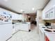 This kitchen has white cabinets and a breakfast nook at 3965 Journey Ct, Casselberry, FL 32707