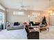 Relaxing living room with ample natural light and comfortable seating at 3965 Journey Ct, Casselberry, FL 32707
