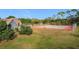 Community tennis court with surrounding green space at 3965 Journey Ct, Casselberry, FL 32707