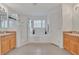 Primary bathroom with double sinks, soaking tub, and walk-in shower at 4783 Cumbrian Lakes Dr, Kissimmee, FL 34746