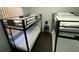 Bedroom featuring two sets of bunk beds with metal frames at 8711 Rockingham Ter # D, Kissimmee, FL 34747