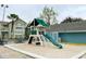 Community playground with slide and play area at 8711 Rockingham Ter # D, Kissimmee, FL 34747