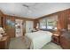 Bright bedroom with double bed and built-in closets at 115 Palm Dr, Eustis, FL 32726