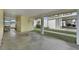 Covered carport with concrete flooring at 115 Palm Dr, Eustis, FL 32726