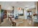 Galley style kitchen with white cabinets and wood counter at 115 Palm Dr, Eustis, FL 32726