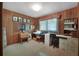 Home office with desk and ample storage at 115 Palm Dr, Eustis, FL 32726