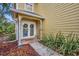 Front entrance with double doors and a welcoming mat at 1445 Creekside Cir, Winter Springs, FL 32708