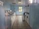 Shared laundry room with several washers and dryers at 3054 George Mason Ave # 6, Winter Park, FL 32792