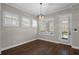 Bright breakfast nook with hardwood floors and plantation shutters at 562 Windy Pine Way, Oviedo, FL 32765