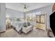 Serene bedroom with a white bedspread and green pillows at 735 Maryland Ave, Winter Park, FL 32789