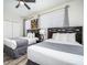 Guest bedroom with two double beds and ceiling fan at 8001 Cool Breeze Dr # 121, Orlando, FL 32819