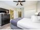Spacious bedroom with a queen-size bed and an ensuite bathroom at 8001 Cool Breeze Dr # 121, Orlando, FL 32819