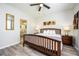 King-size bed, ensuite bathroom access, and a modern aesthetic at 8001 Cool Breeze Dr # 121, Orlando, FL 32819