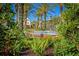 Landscaped courtyard with a central fountain at 8001 Cool Breeze Dr # 121, Orlando, FL 32819